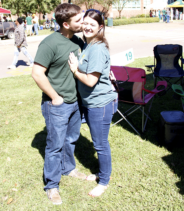 Hayes Walker and Megan Bonck enjoy the Homecoming Tailgating together after being engaged at the tailgate last year. Walker and Bonck returned to their Alma Mater to enjoy the festivities in anticipation for their December wedding.
